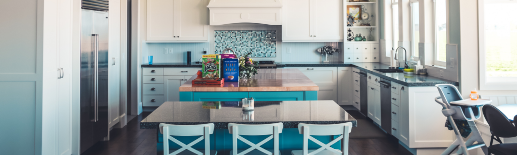 Modern family kitchen with bright cabinetry and contemporary design — featured Dublin property by Doran Estates, leading estate agents in Ireland.